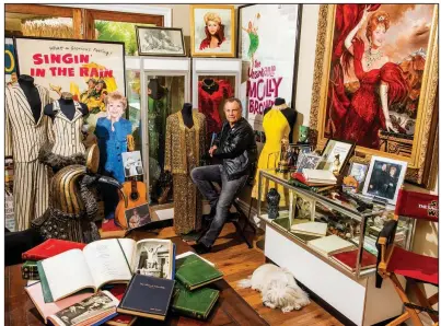  ?? (The New York Times/Roger Kisby) ?? Todd Fisher, Debbie Reynolds’ son, is surrounded by costumes from the late actress’s collection.