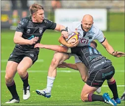  ??  ?? Ayrshire’s Christian Townsend tackles Southern Knights’ Nyle Godsmark at the Greenyards