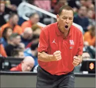  ?? Brett Coomer / Houston Chronicle ?? Houston coach Kelvin Sampson celebrates a defensive stop against Illinois during the Cougars’ win in the NCAA Tournament on Sunday in Pittsburgh.