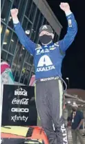  ?? SEAN GARDNER/GETTY ?? William Byron celebrates atop his No. 24 Chevrolet after winning the NASCAR Cup race at Homestead-Miami Speedway on Sunday.