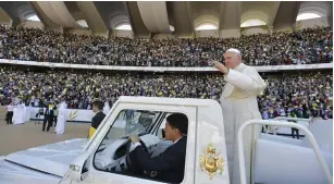  ?? (Vatican Media/Reuters) ?? POPE FRANCIS arrives at the Zayed Sports City Stadium in Abu Dhabi, United Arab Emirates yesterday.