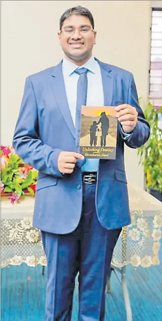  ?? Picture: SUPPLIED ?? Druvkaran Nand unlocks the door to his success when he launched his first book ‘Unlocking Destiny’.