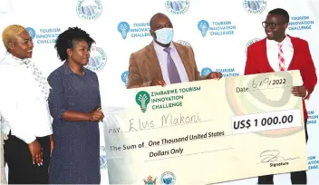  ?? ?? Mr Elvis Makoni (far right) is all smiles as he receives his prize for coming out tops in the Manicaland Province Tourism Innovation Challenge. Handing him the US$1000 cheque is (from left) Zimbabwe Tourism Authority area manager for the Eastern Region, Ms Ropafadzo Dunira; ZTA executive director for domestic tourism, Ms Sophie Zirebwa and a director in the office of the Minister of State for Manicaland Provincial Affairs and Devolution, Mr Munyaradzi Rubaya. — Picture by Tinai Nyadzayo