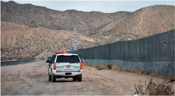  ?? AP PhOTO/RUSSELL CONTRERAS ?? In this 2016 file photo, a U.S. Border Patrol agent patrols Sunland Park along the U.S.-Mexico border next to Ciudad Juarez.