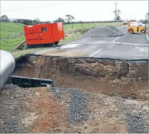  ??  ?? Te Poi Rd last Tuesday, above, after heavy rain washed out the culvert. At right, the road has been excavated ready for the new pipes.