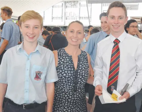  ??  ?? HIGH ACHIEVERS: Jodie Vincent and her sons, Harley, currently in Year 9 and Levi, who graduated last year, at the St Augustine College’s academic awards assembly on February 7.