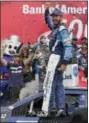  ?? CHUCK BURTON — THE ASSOCIATED PRESS ?? Martin Truex Jr celebrates in Victory Lane after winning a NASCAR Cup Series auto race at Charlotte Motor Speedway in Concord, N.C., Sunday.