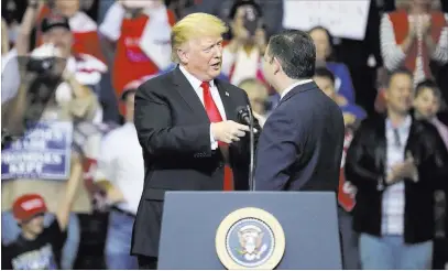  ?? Eric Gay ?? President Donald Trump embraces Sen. Ted Cruz, R-texas, during a campaign rally Monday in Houston. The Associated Press