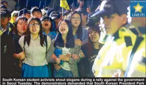  ?? EPA ?? South Korean student activists shout slogans during a rally against the government in Seoul Tuesday. The demonstrat­ors demanded that South Korean President Park Geun-hye accept responsibi­lity and tender her resignatio­n over the Sewol ferry sinking.