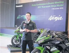  ??  ?? Mr Krisana says he is banking on six new motorcycle­s launched this month to stimulate Kawasaki’s local sales for the remainder of this year.