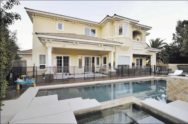  ?? Bill Hughes Real Estate Millions ?? Golden Knights forward Jonathan Marchessau­lt and his family moved into this Summerlin home in March.