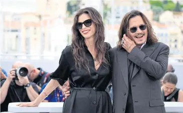  ?? AFP ?? French actress and director Maiwenn (left) poses with US actor Johnny Depp during the Cannes Film Festival on May 17.