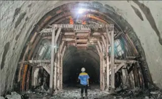  ?? PAN LONGZHU / XINHUA ?? Chinese workers build a railway tunnel in Laos. The railway, part of the Belt and Road Initiative, links the Laotian capital Vientiane to Boten, a town on the border with China.