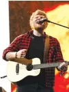  ??  ?? Singer Ed Sheeran performs at the Glastonbur­y Festival at Worthy Farm, in Somerset, England, on Sunday. (AP)