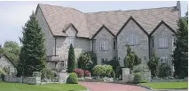  ??  GORAN TODOROVIC ?? This house, near Windsor, Ont., is listed at $970,000. It has five bedrooms and five baths, as well as a garden house.