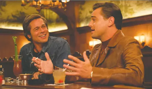  ?? PHOTOS: SONY PICTURES ?? The characters played by Brad Pitt, left, and Leonardo Dicaprio are trying to navigate fading stardom in Quentin Tarantino’s tribute to Hollywood’s golden age.