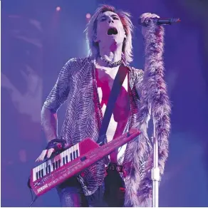  ?? ED KAISER ?? Frontman Josh Ramsay of Marianas Trench channels the 1980s as the band performs at Rexall Place on Friday night.
