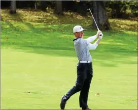  ?? THOMAS NASH - DIGITAL FIRST MEDIA ?? Pope John Paul II’s J.T. Spina hits his second shot from the fairway on No. 18 during the Eastern Regional Tournament.