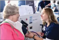  ?? JESI YOST - FOR MEDIANEWS GROUP ?? Emily Peifr, RN, checks the blood pressure of Barb Silvano of Pottstown at the 6th floor unit Pottstown Hospital – Tower Health Community Festival table where she was offering blood pressure screening and stroke education.