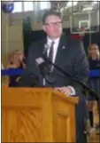  ??  ?? Cardinal O’Hara High School President Jay DeFruscio welcomes Our Lady of Angels students to the school during a Wednesday morning pep rally.