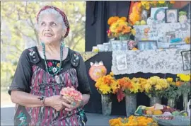  ?? Katie Falkenberg For The Times ?? OFELIA ESPARZA, an East L.A. native known for crafting Day of the Dead altars, is one of nine artists selected for a 2018 NEA National Heritage Fellowship.