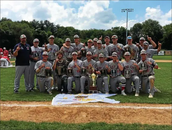  ?? THOMAS NASH — DIGITAL FIRST MEDIA ?? Members of the Spring City American Legion baseball team gather with the trophy after winning the Pa. State Tournament Championsh­ip on Wednesday afternoon at Bear Stadium. The Red Sox beat Souderton 6-1 for their first State Tournament title since 2010.