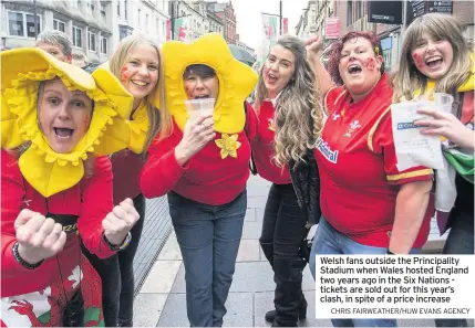  ?? CHRIS FAIRWEATHE­R/HUW EVANS AGENCY ?? Welsh fans outside the Principali­ty Stadium when Wales hosted England two years ago in the Six Nations tickets are sold out for this year’s clash, in spite of a price increase