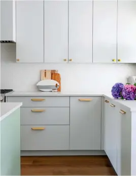  ??  ?? DESIGN, Triple Dot Design. CONTRACTOR, Level One Constructi­on. Brushed gold CABINETRY PULLS, Richelieu Hardware. Champagne Bronze FAUCETS, Delta. BACKSPLASH TILES, Centura. SMALL MILK JUG, WHITE CANISTERS, Rentfluff. CUTTING BOARDS, Chapters Indigo. GLASS, Dougherty Glass Works.