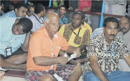  ?? Photo: Wati Talebula ?? Subhash Chand asks the Minister for Local Government, Urban Developmen­t, Housing and Environmen­t Parveen Bala a question during the consultati­on at Vunivau in Labasa on May 3, 2018.