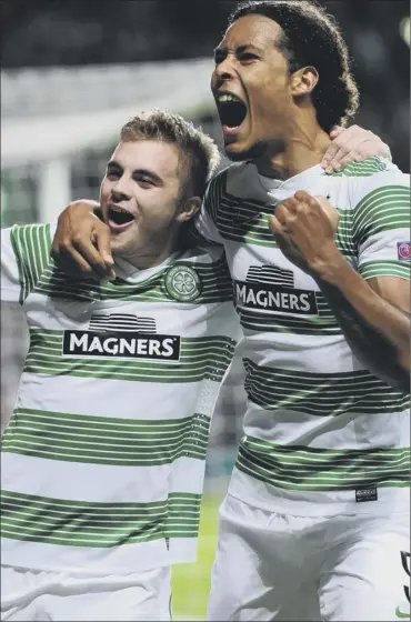  ?? Picture: Ian Rutherford ?? James Forrest, left, celebrates with Virgil van dijk after scoring from the spot