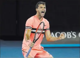  ?? Dita Alangkara ?? The Associated Press Bulgaria’s Grigor Dimitrov exults after beating Australia’s Nick Kyrgios in their Australian Open fourth-round match Sunday in Melbourne, Australia.