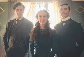  ??  ?? Millie Bobby Brown, Henry Caville (left) and Sam Claflin in Enola Holmes.