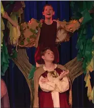  ??  ?? Dresses: Far left, Dresses and laurel crowns Lily Phillips built for SAAC’s Teen Drama Club’s production of “A Midsummer Night’s Dream.” Left, Maggie Phillips (top) as Puck and Walt Phillips (bottom) as Oberon in the South Arkansas Arts Center’s Teen Drama Club’s production of “A Midsummer Night’s Dream.” Lily Phillips built both of the character’s costumes. Bottom left, is a selfportra­it Lily painted last year. Middle, A quilt made by Lily. Below, Lily prepares a sewing project.