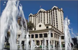  ?? STAFF ARCHIVES ?? The Fairmont Hotel with the Plaza de Cesar Chavez fountain in the foreground in downtown San Jose on October 4, 2007. The hotel filed for bankruptcy, but could reopen.