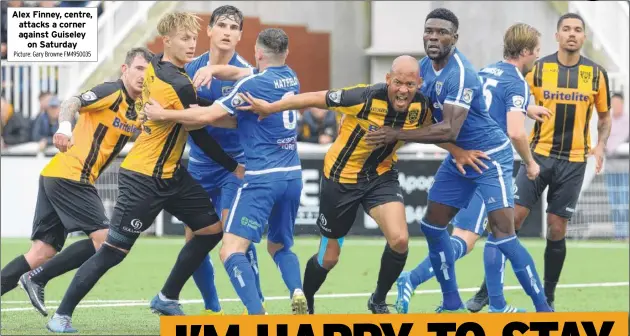  ?? Picture: Gary Browne FM4950035 ?? Alex Finney, centre, attacks a corner against Guiseley on Saturday