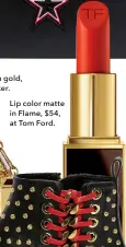  ??  ?? Macy Flames bag in gold,$1,695, at Edie Parker.Lip color matte in Flame, $54, at Tom Ford.