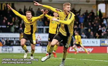  ?? ?? OPENER: Ryan Leak wheels away after scoring Burton’s goal.