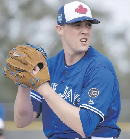 ?? FRANK GUNN/THE CANADIAN PRESS ?? Pitcher Aaron Sanchez, shown training Wednesday in Dunedin, Fla., could be key to the Toronto Blue Jays’ hopes for a spot in the playoffs in 2018.