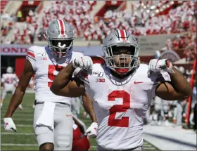  ?? DARRON CUMMINGS — THE ASSOCIATED PRESS ?? Ohio State running back J.K. Dobbins (2) celebrates after scoring a touchdown during the first half against Indiana, on Sept. 14 in Bloomingto­n, Ind.