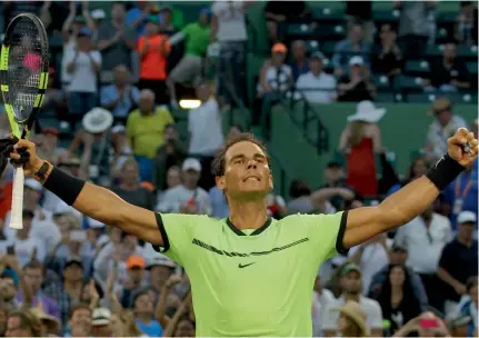  ?? — AP ?? Rafael Nadal reacts after defeating Philipp Kohlschrei­ber 0-6, 6-2, 6-3 in their Miami Open third round match on Sunday.