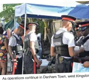  ??  ?? As operations continue in Denham Town, west Kingston, the joint police-military command remains vigilant in the execution of its duties.