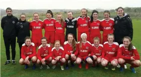  ??  ?? The U14 Sligo/ Leitrimgir­ls soccer team who were overall winners at the recent Inishowen Tournament with coaches Alan Henry and Catherine Hyndman.