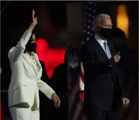  ?? AFP ?? El presidente electo, Joe Biden, y la vicepresid­enta, Kamala Harris, subieron al escenario en el Chase Center, para dar el discurso de la victoria, la noche del sábado, en Wilmington, Delaware.
