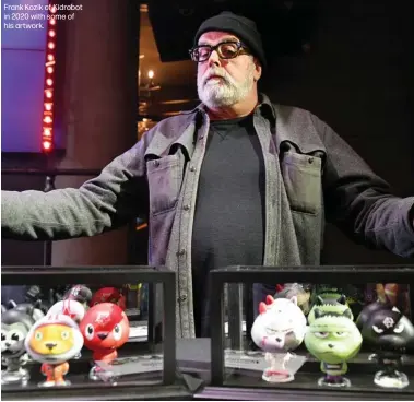  ?? ?? Frank Kozik of Kidrobot in 2020 with some of his artwork.