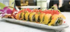  ?? ?? A Mango Tango Roll is seen Thursday at the new Randevoo location in Downtown Allentown Market.