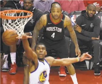  ?? Eric Christian Smith / Associated Press ?? P.J. Tucker (4) and Chris Paul (right) are among the players the Rockets acquired in the offseason to build a team that could challenge the Warriors in the Western Conference.