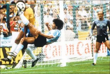  ?? Harry Melchert Picture All i ance ?? DIEGO MARADONA aims an overhead kick during a match in 1982. The Argentine soccer great lived a chaotic, tabloid- ready life, and his death last week at age 60 has been just as messy.