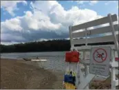  ?? PAUL POST — PPOST@ DIGITALFIR­STMEDIA. COM ?? Lifeguards didn’t have much work to do Tuesday as crowds have been slow returning to Moreau Lake State Park’s swimming beach.