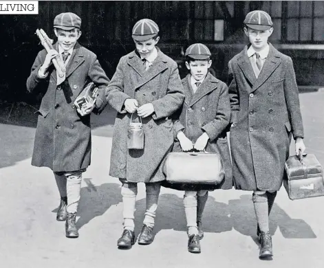  ??  ?? School’s out: Alan Turing, on far left, with friends Robin and John Wainwright and Hugh Highet at Waterloo station
