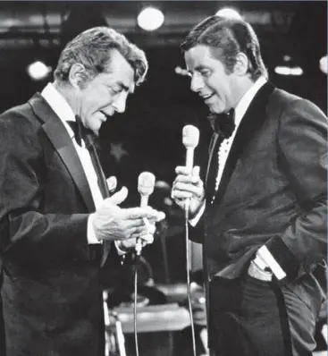  ?? THE ASSOCIATED PRESS FILE PHOTO ?? Comedy duo Dean Martin and Jerry Lewis reunite for Lewis’s annual muscular dystrophy telethon in Las Vegas in 1976.